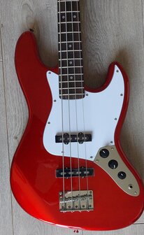 SX elektrisch basgitaarpakket, met versterker, tas, riem, tuner en kabel, candy apple red