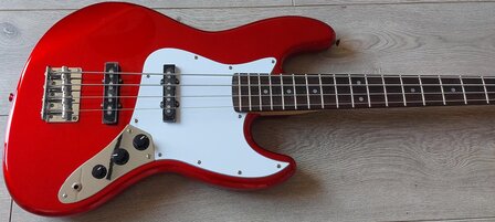 SX elektrisch basgitaarpakket, met versterker, tas, riem, tuner en kabel, candy apple red