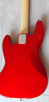 SX elektrisch basgitaarpakket, met versterker, tas, riem, tuner en kabel, candy apple red