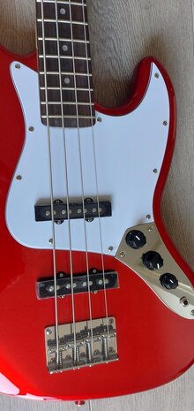 SX elektrisch basgitaarpakket, met versterker, tas, riem, tuner en kabel, candy apple red