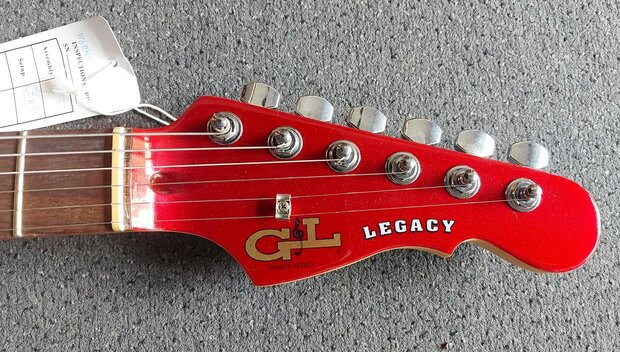 G&L Legacy Candy Apple Red RW, matching headstock